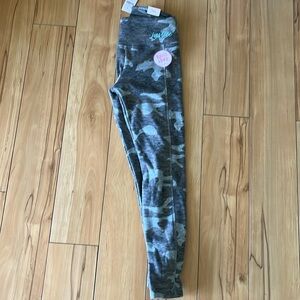 NWT Fleece lined Justice pants.  Size 8